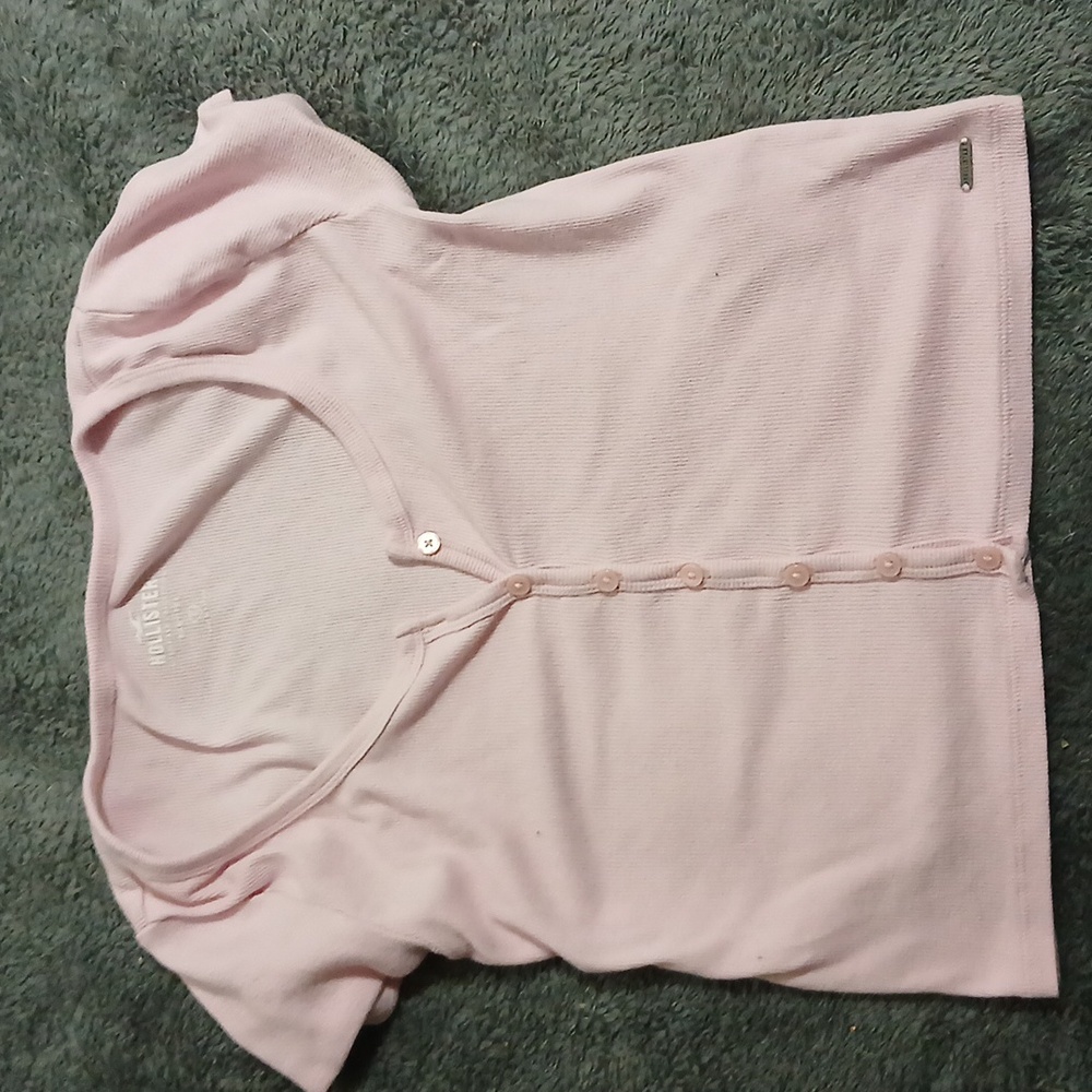 A pink baby tee from Hollister